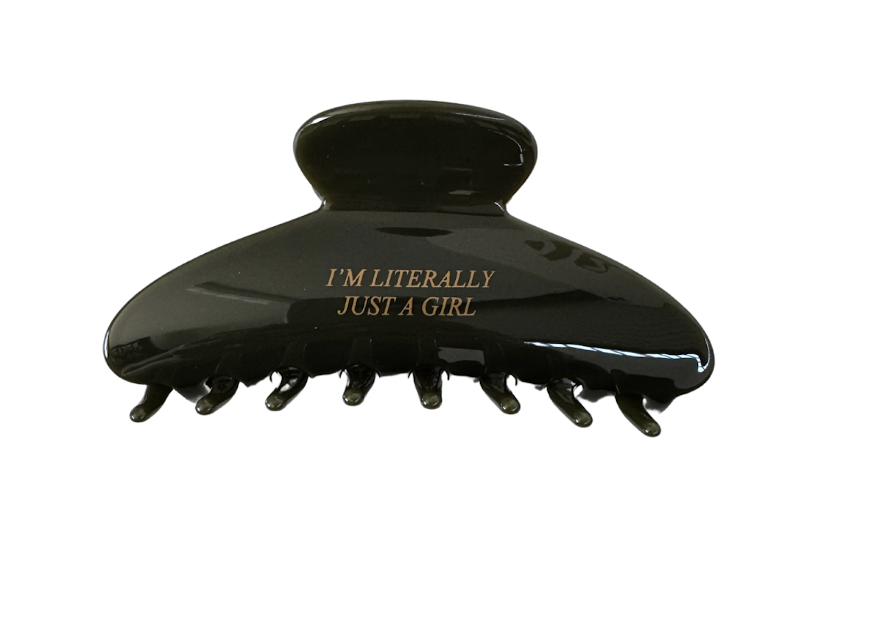 Black hair clip with 'I'm Literally Just a Girl' text on a white background